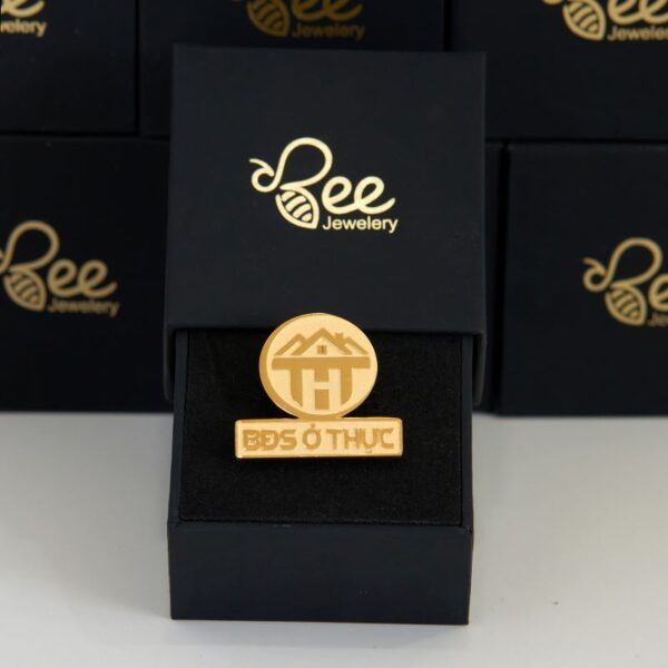 huy hiệu mạ vàng