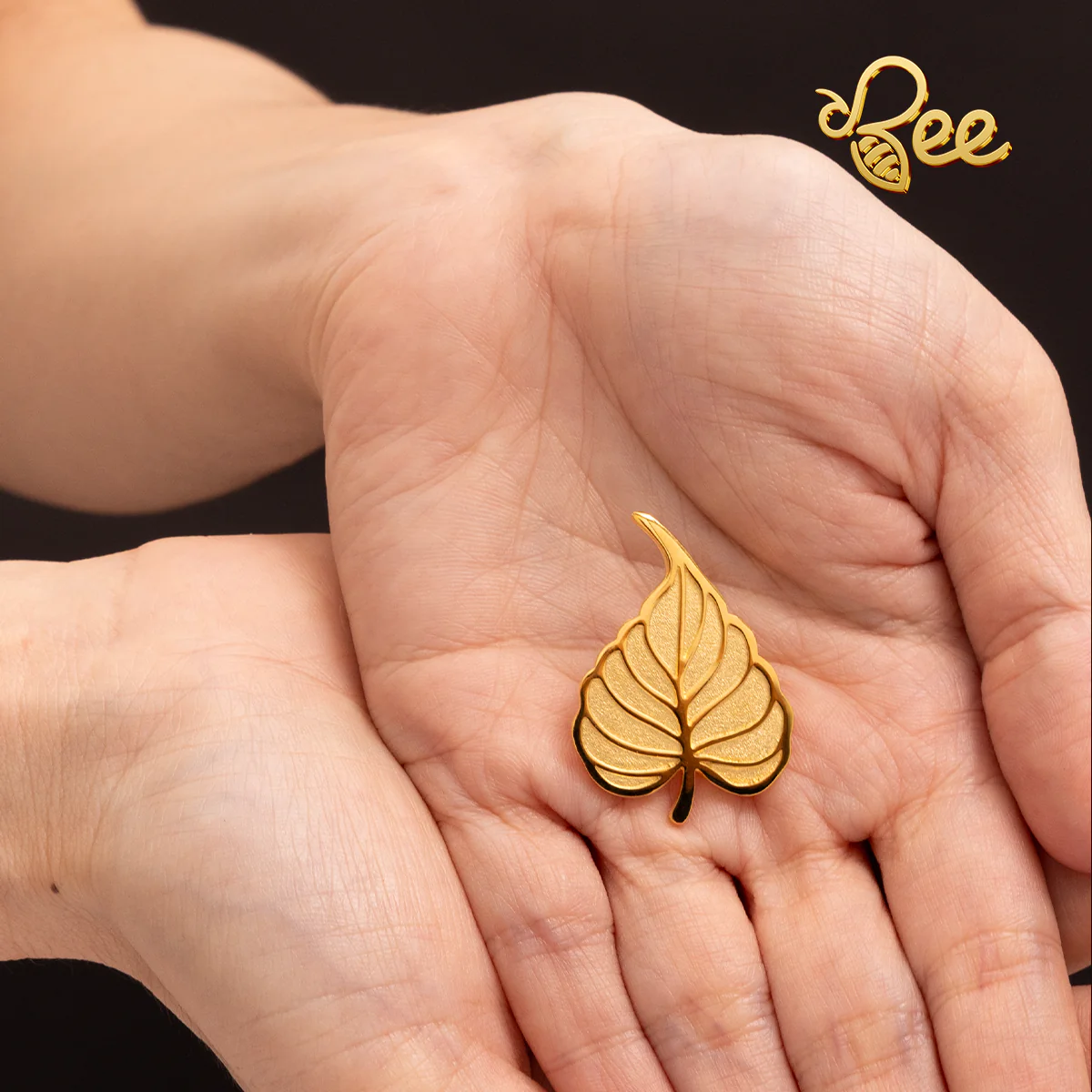 huy hiệu mạ vàng 24K lá bồ đề